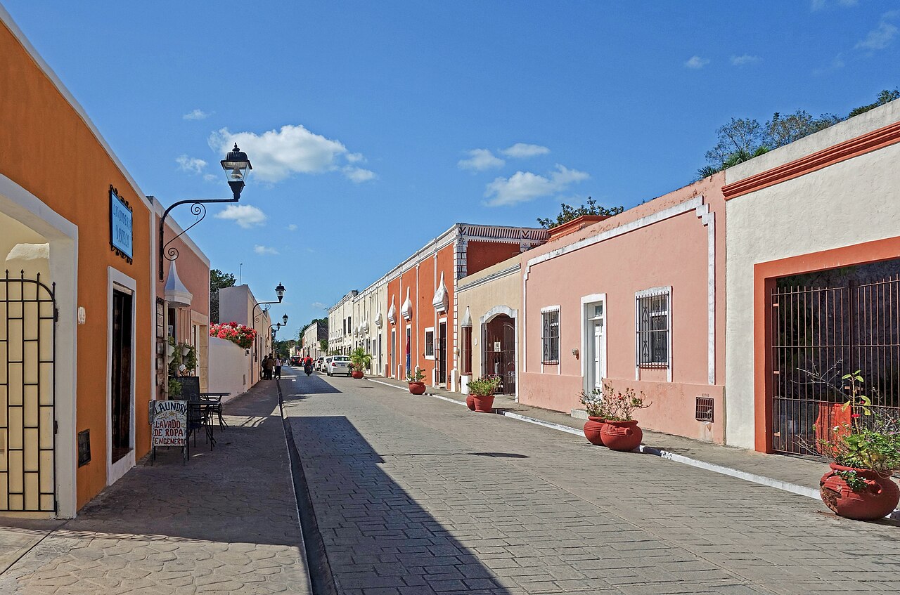 Painted colonial facades on a street in Valladolid